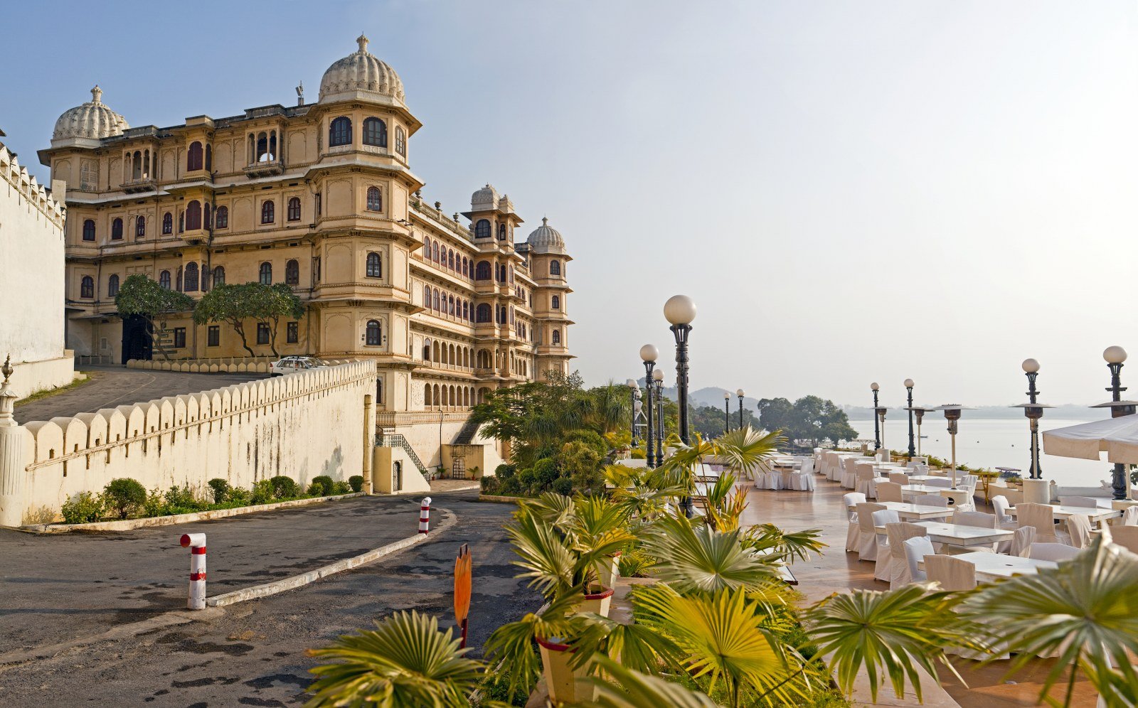 The City Palace historic palace building on the shores of the lake at Udaipur India.