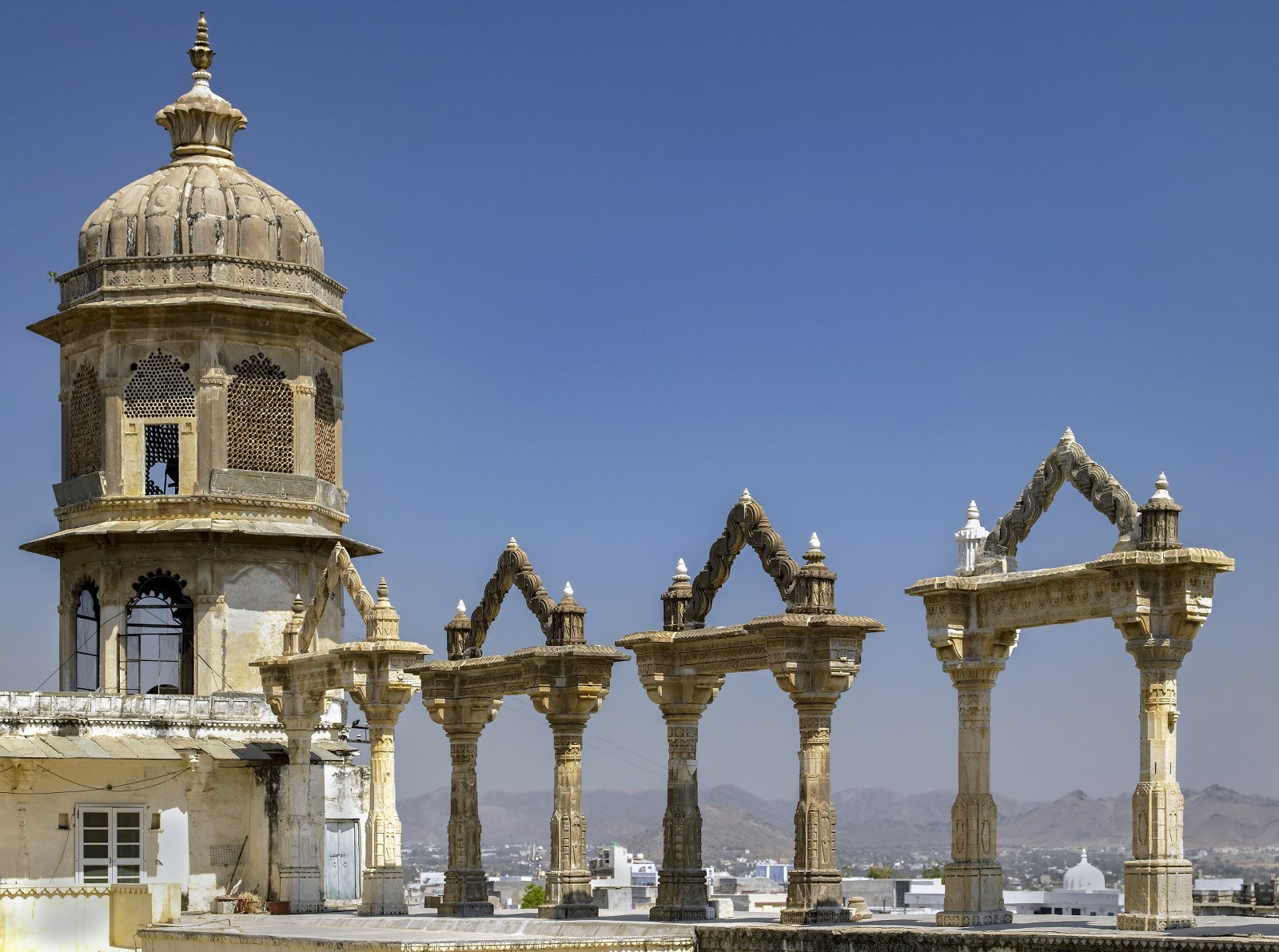 Architectural detail on the roof of the City Palace in the city of Udaipur in the state of Rajasthan, India.